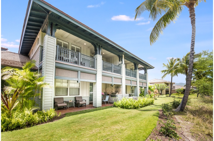 The back ground floor lanai upstairs terrace offer peace and tranquility gazing onto open space and a peek-a-boo golf course view.