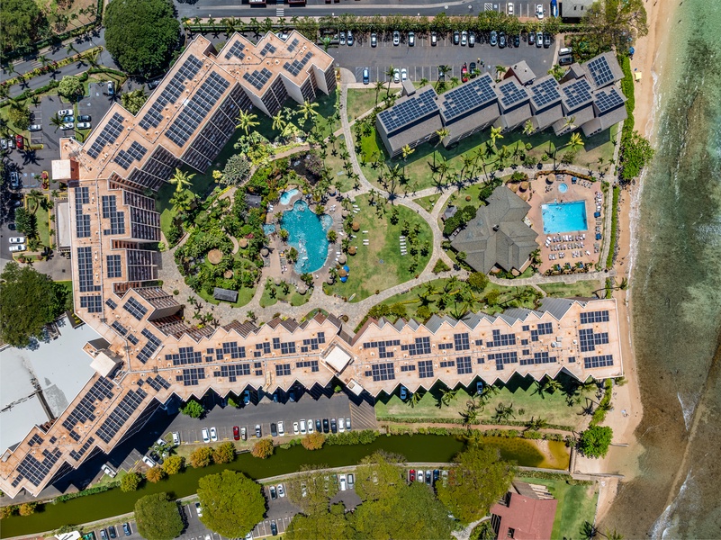 Kaanapali Shores aerial reveals lush grounds and two resort-style pools in paradise.