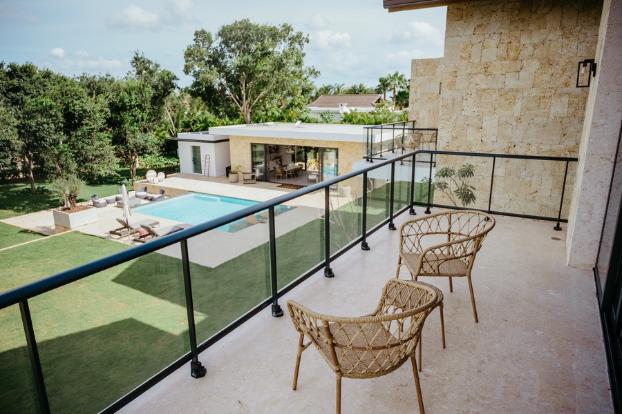 A perfect setting for enjoying the great view of the pool and garden area.