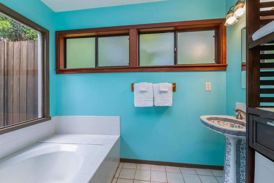 Ensuite primary with tile shower and soaking tub