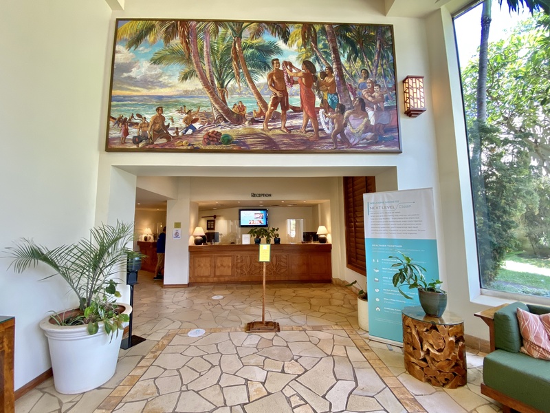 Step into the welcoming lobby, where island art and warm, tropical décor set the tone for a relaxing stay in paradise.