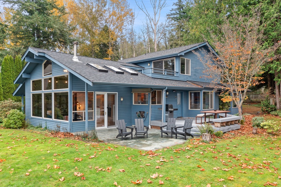 Step outside to landscaped grounds and cozy outdoor seating—designed for connection, comfort, and coastal charm.