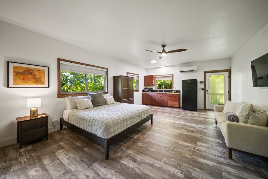 Detached studio suite featuring a king bed, flat-screen TV, and private entry—ideal for added privacy.