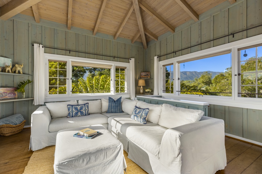 Grab a book and curl up on the pull-out sofa bed with garden views.