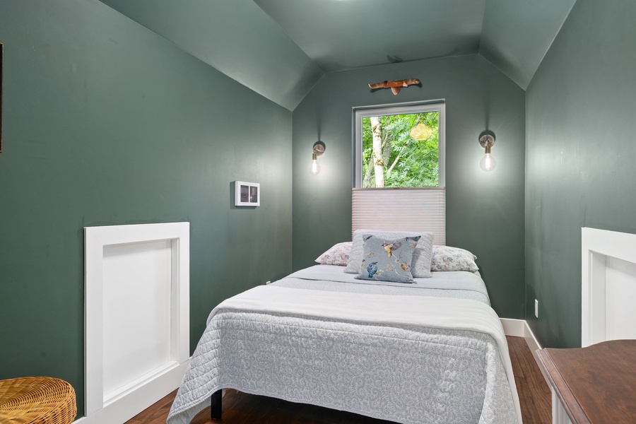 A cozy solo retreat with peaceful views and gentle natural light.