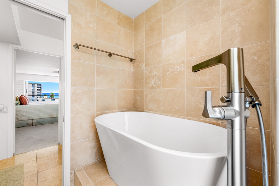 Every bathroom in the home is equipped for comfort, featuring plush towels, spacious vanities, and serene tones.