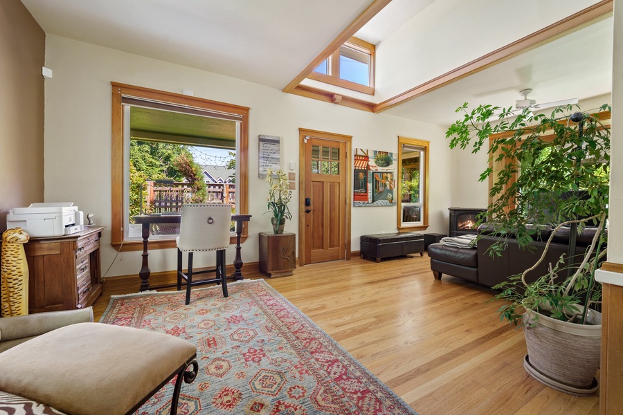 Bright and airy living room with ample seating, ideal for unwinding or gathering with loved ones.