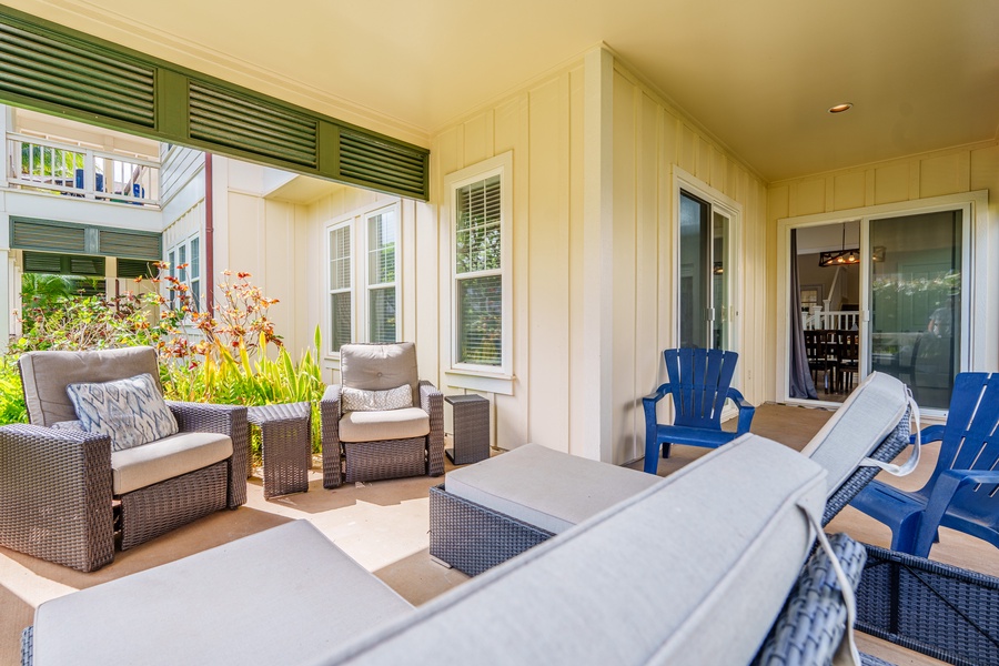 Enjoy a drink on the lanai next to a well-manicured gardens.