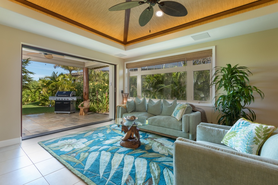 The welcoming living space opens to a covered lanai.