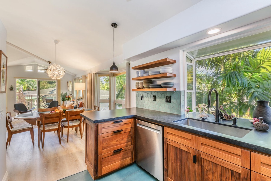 Seamless flow between the kitchen, dining and living areas, even stretching out to the lanai.