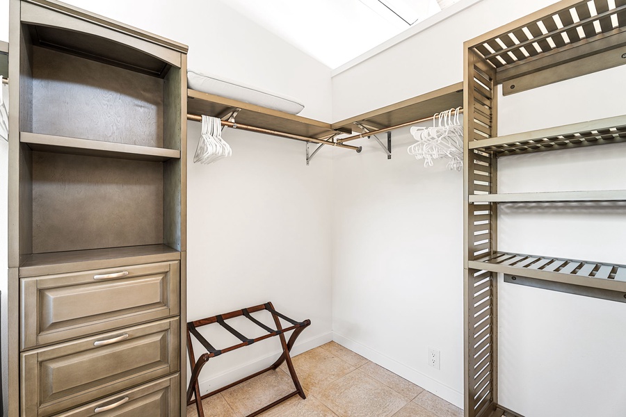 Settle in with a spacious walk-in closet, offering room for everything you bring along.