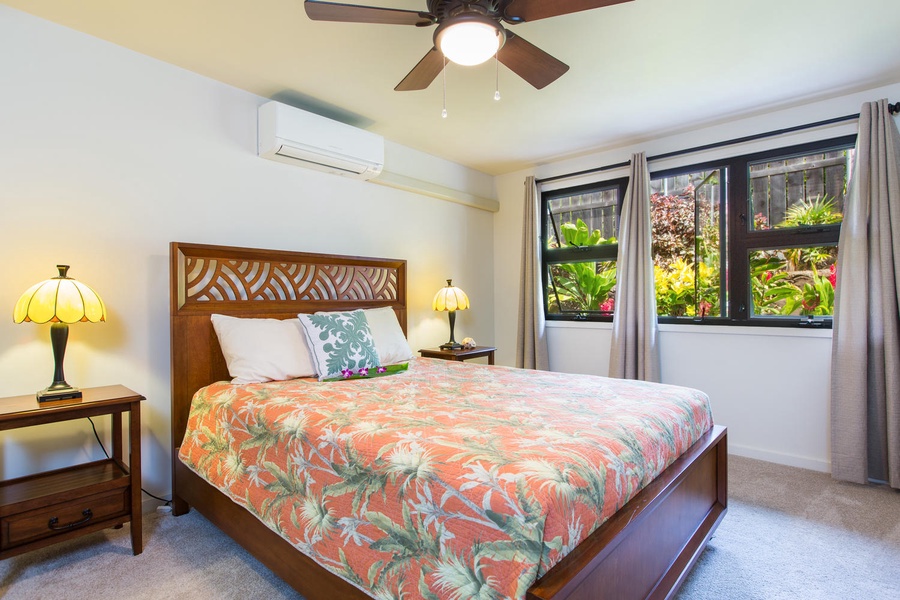 Bedroom four, with beautiful garden views and split air conditioning for warm summer days.