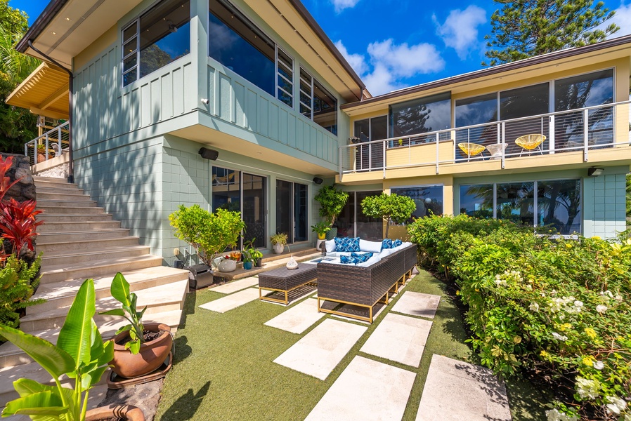 A seamless connection between outdoor patios and the home’s main gathering spaces.