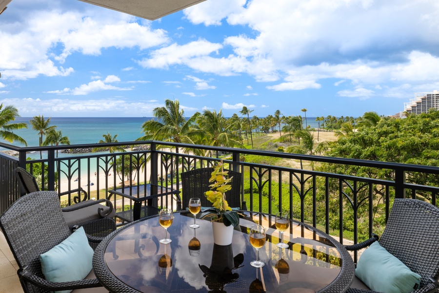 Sip wine on your private lanai while soaking in stunning ocean views and swaying palms—pure tropical bliss awaits.