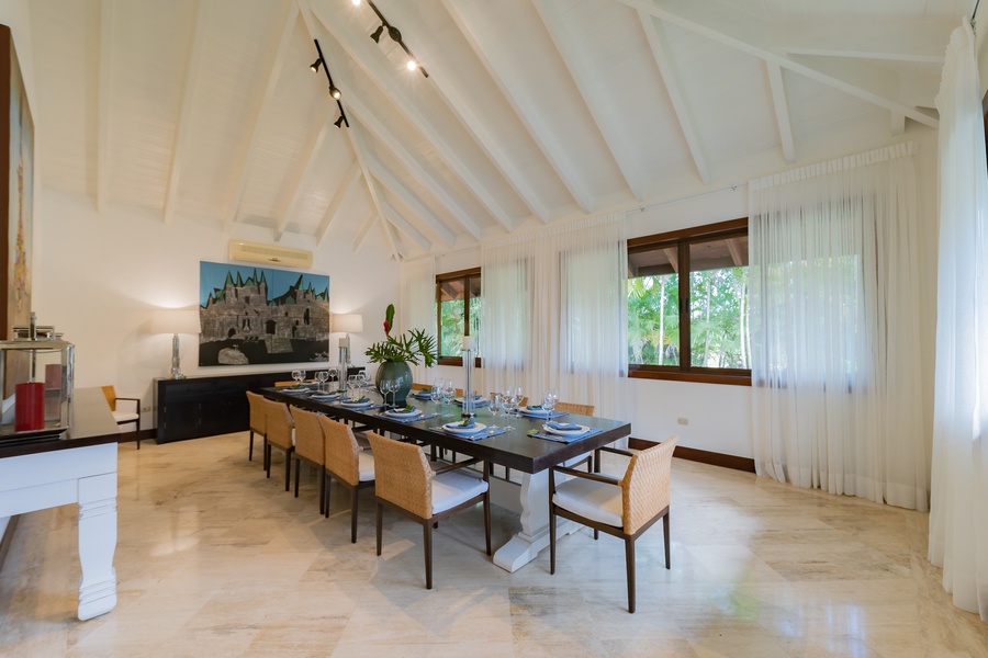 Have memorable meals with family and friends in this elegant dining room with a vaulted ceiling.
