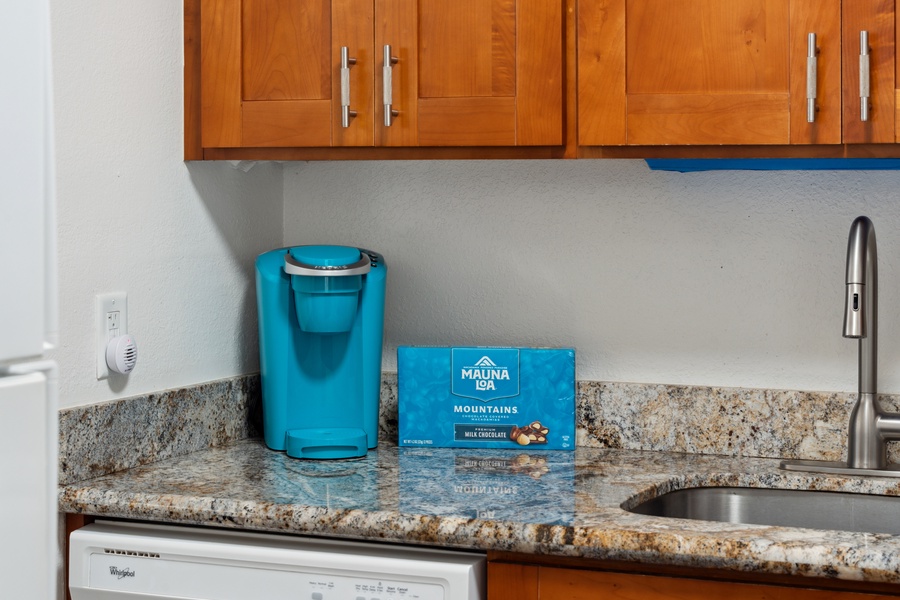 Royal Kahana 308's kitchen includes essentials like a Keurig coffee maker to kickstart your Maui mornings with ease.