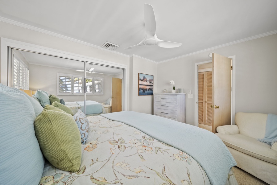 Experience a restful night with premium bedding in this tropical island escape.