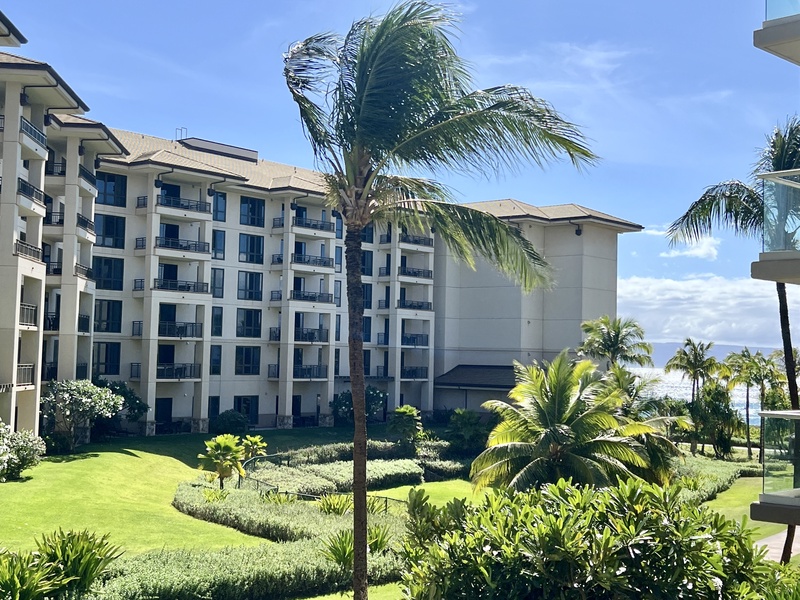 Enjoy the serene afternoon views of the lush resort grounds from Hokulani 214 lanai.