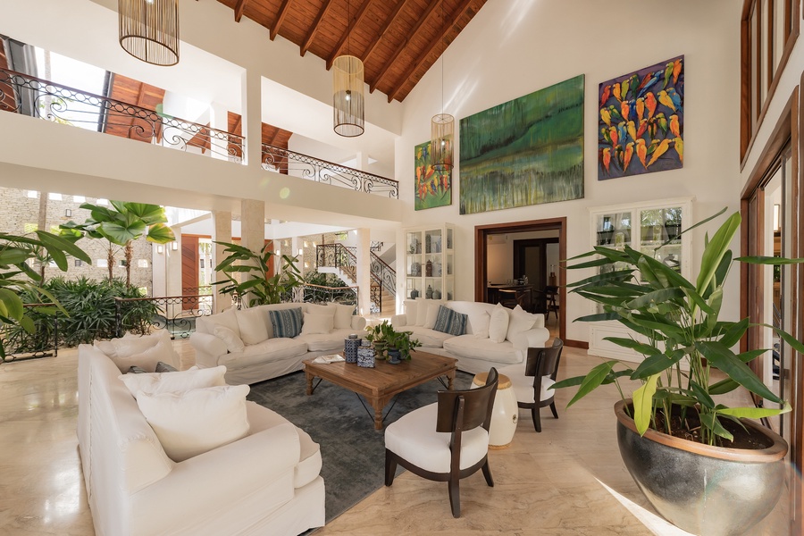 Charming sitting area with vibrant artwork, offering a cozy space to unwind.