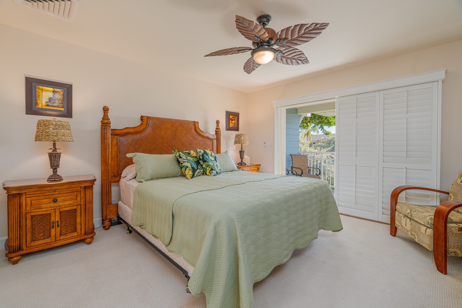 A comfortable king bed with ceiling fan for your private sanctuary.