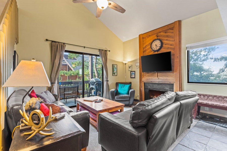 Unwind by the cozy fireplace in the living area, with a smart TV for binge-watching favorites on a chill evening.