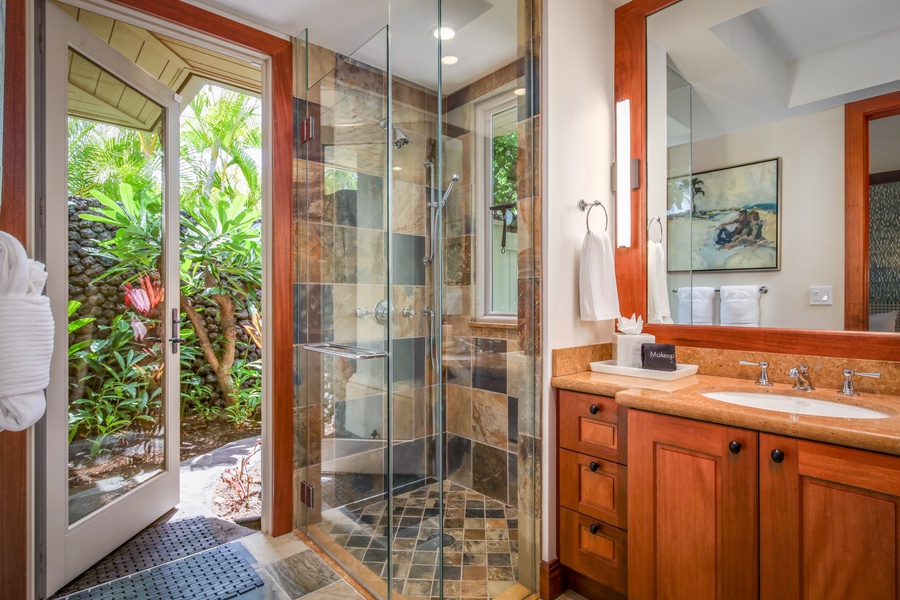Full en suite bath in Guest Room 3 with walk-in shower and outdoor shower garden.