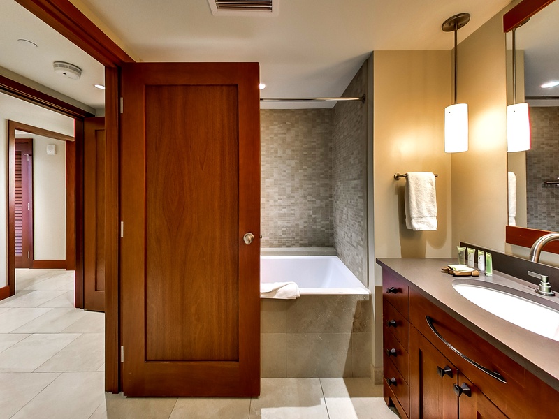 The third guest bathroom with a soaking tub to rest and renew.