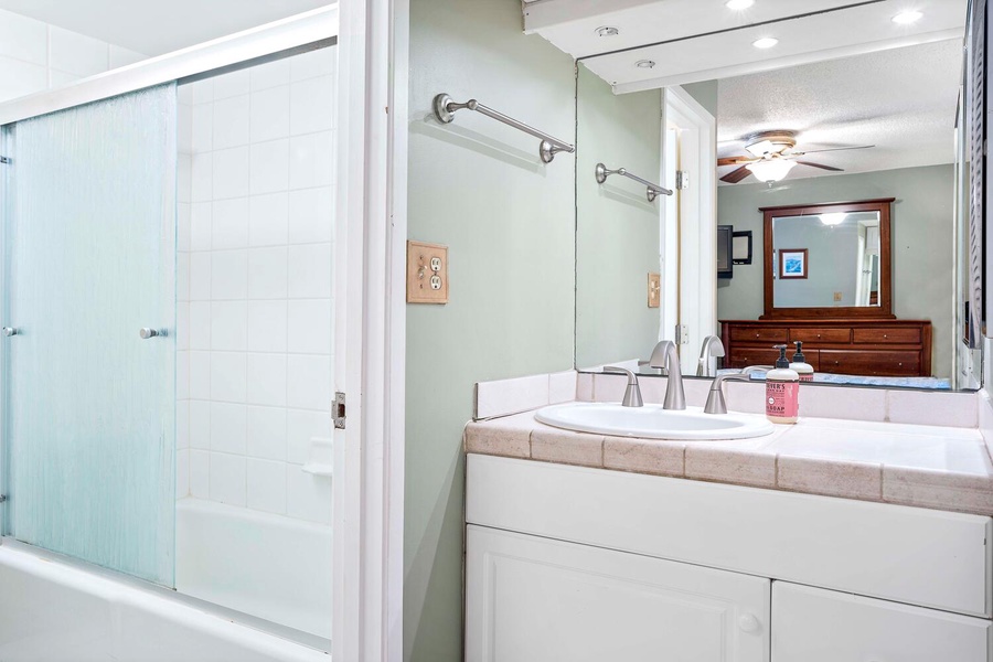 The ensuite bathroom with wide vanity space.