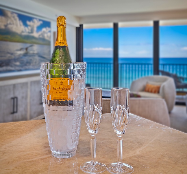 Celebrate your stay with a chilled drink while taking in the stunning ocean view from the living room.