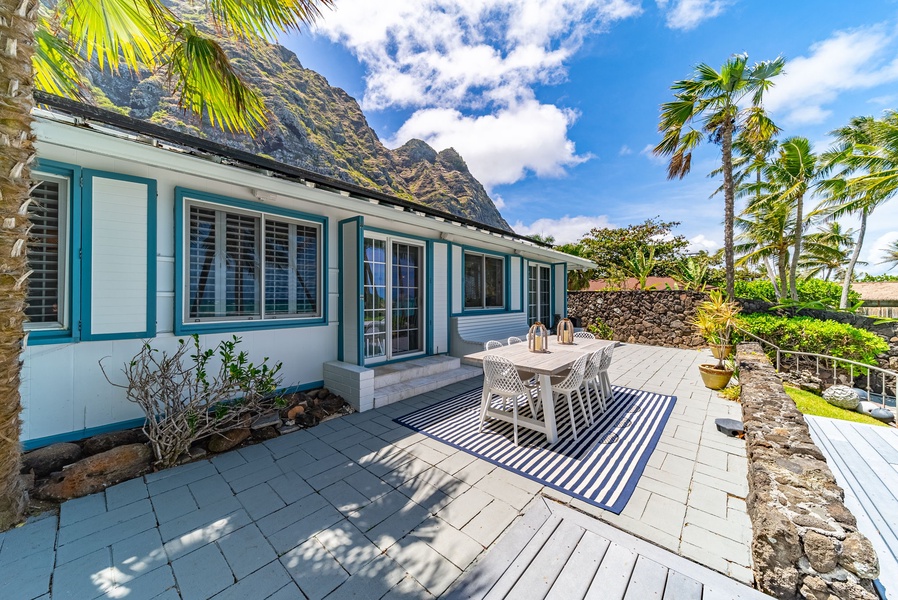 Welcome to your home away from home with lush surroundings and a stylish outdoor seating area!