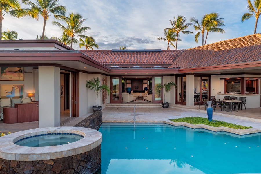 Slip into the spa or float in the pool—indoor-outdoor luxury at its finest.