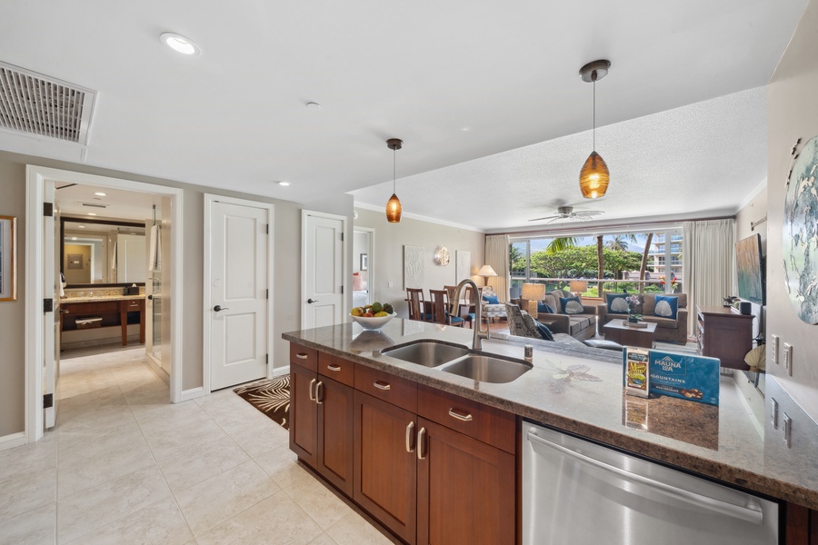 Bright and stylish, the kitchen island at Honua Kai Konea 204 is perfect for meal prep and morning coffee alike.
