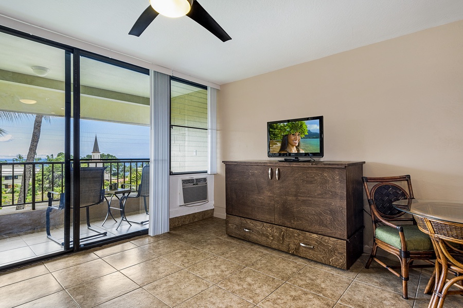 The tv stand is a murphy bed