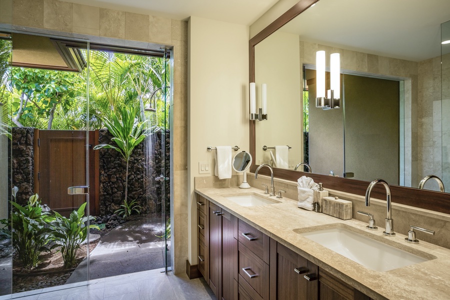 Guest bedroom two en-suite bath with dual vanities, walk-in shower and outdoor shower garden.