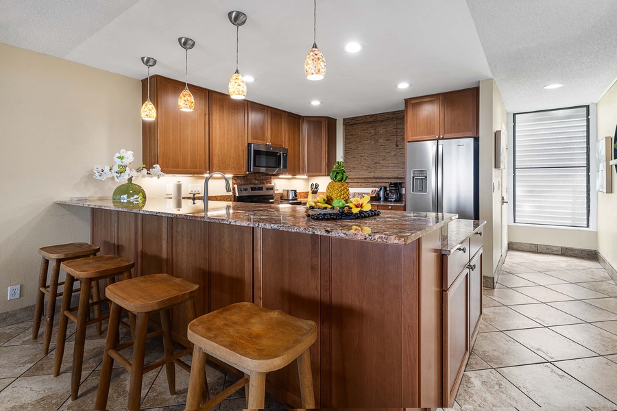 Enjoy casual conversations over morning coffee at the kitchen island, which comfortably seats three.