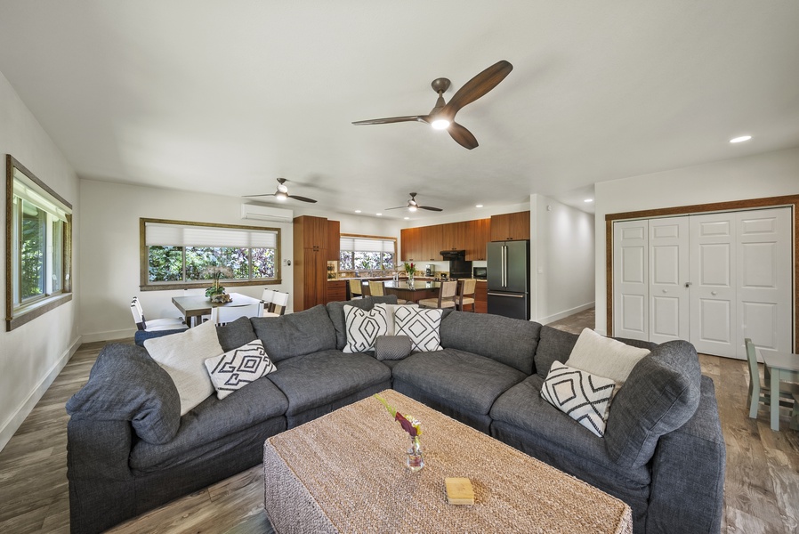 Spacious open-concept living room with sectional seating—perfect for unwinding after a North Shore day.