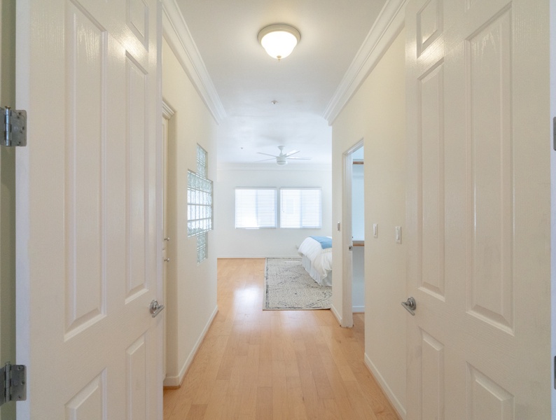 Warm welcome to the roomy master bedroom