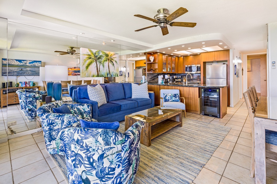 Papakea L-106 features a bright, cozy living space with tropical decor and a ceiling fan