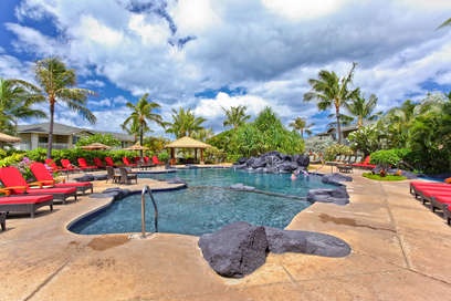 Relax in the lounge chairs at the peaceful scenic pool area.