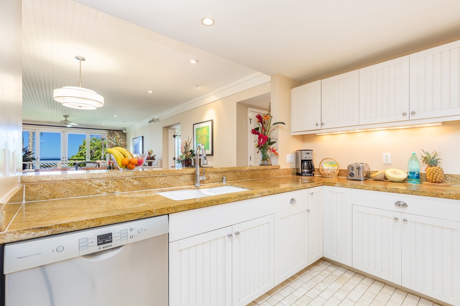 The updated kitchen features all of the appliances you’ll need to recreate your favorite meals and the high ceilings and fine finishes like Brazilian chestnut floors and granite and marble countertops throughout offer the perfect setting for your at-home d