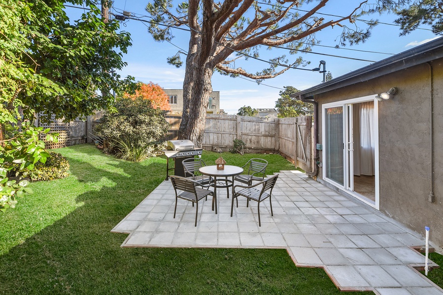 A perfect spot for BBQs and family time in the private yard with tiled patio