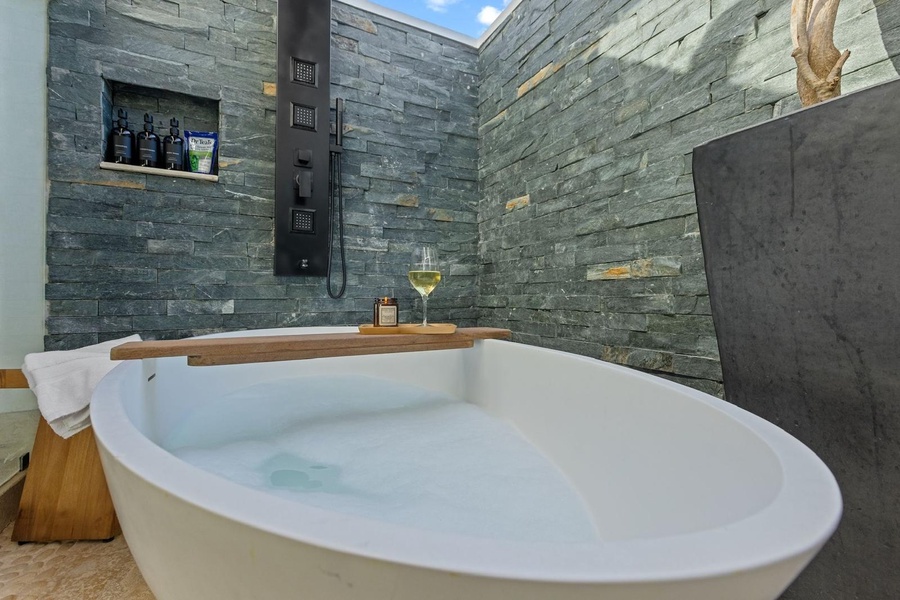 Unwind after a long day in this freestanding tub.