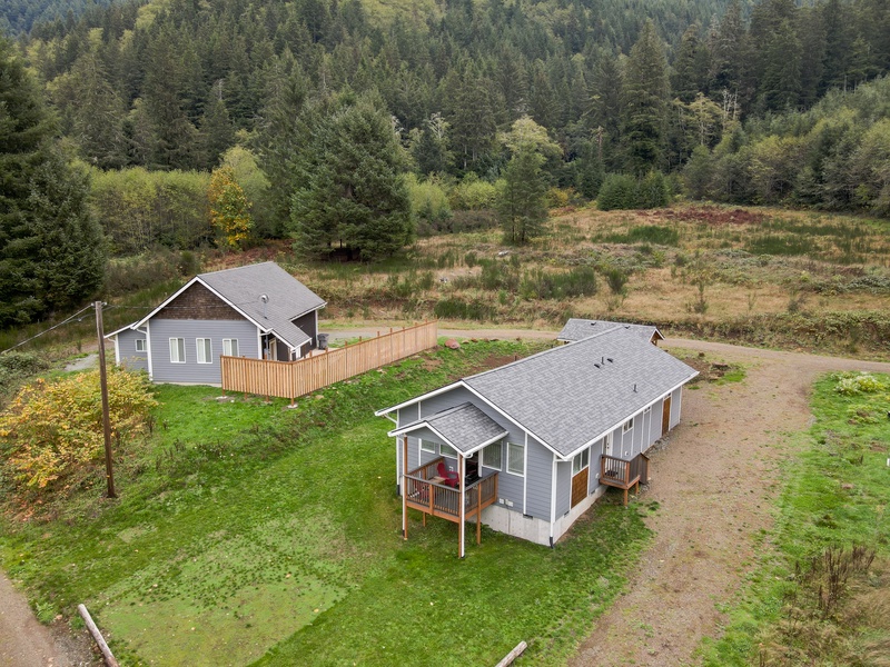 Aerial view of the two properties separated by a fence for privacy.