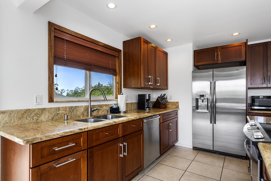 Third floor fully equipped kitchen with stainless appliances