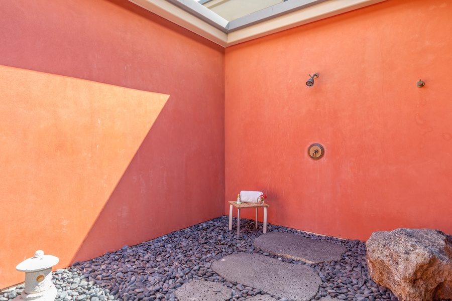 A secluded, open-air shower, because the best mornings begin under the bright blue sky.