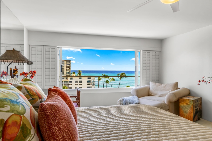 Spacious primary suite with panoramic views of Diamond Head and the coastline, offering a peaceful retreat to begin and end each day.