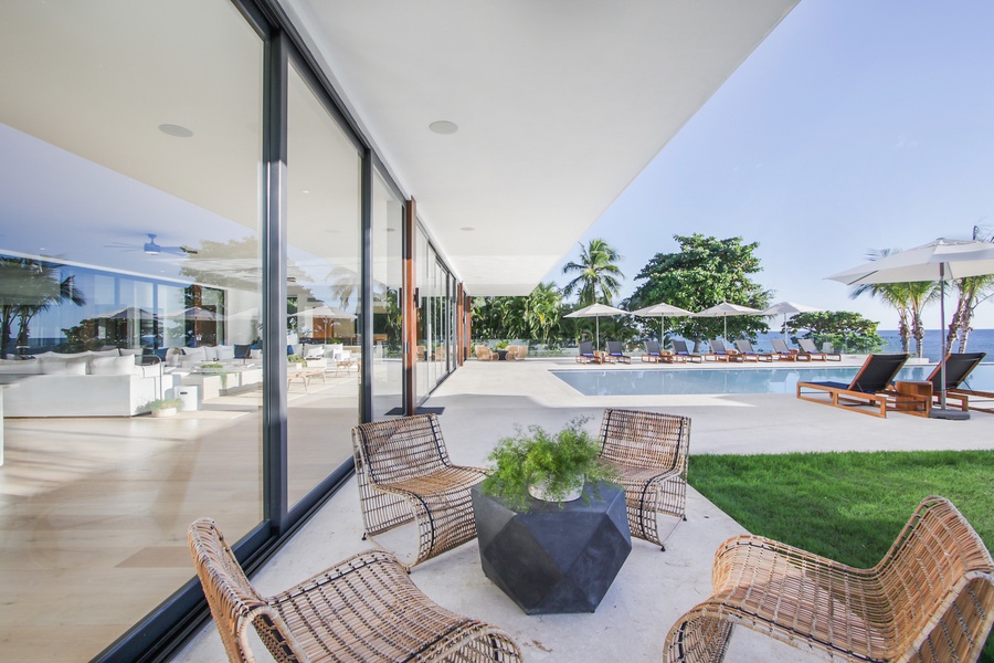 Cozy seating area on the patio, perfect for relaxing by the pool.