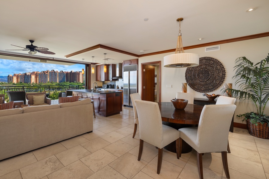 The kitchen island overlooks the living area and smart TV, making it the perfect gathering spot.