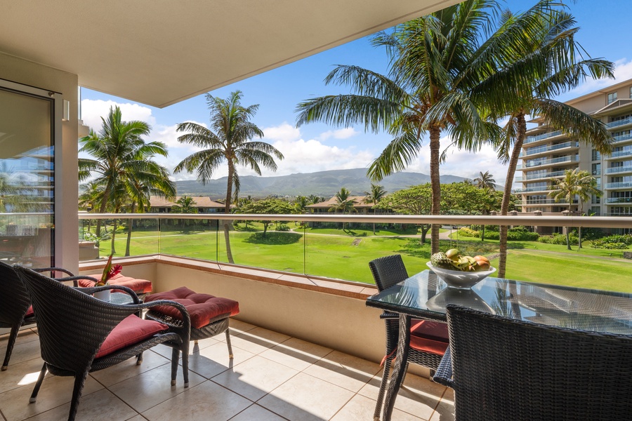 Lanai views from Honua Kai Konea 204 frame Maui’s lush gardens and blue skies with space to dine or lounge.