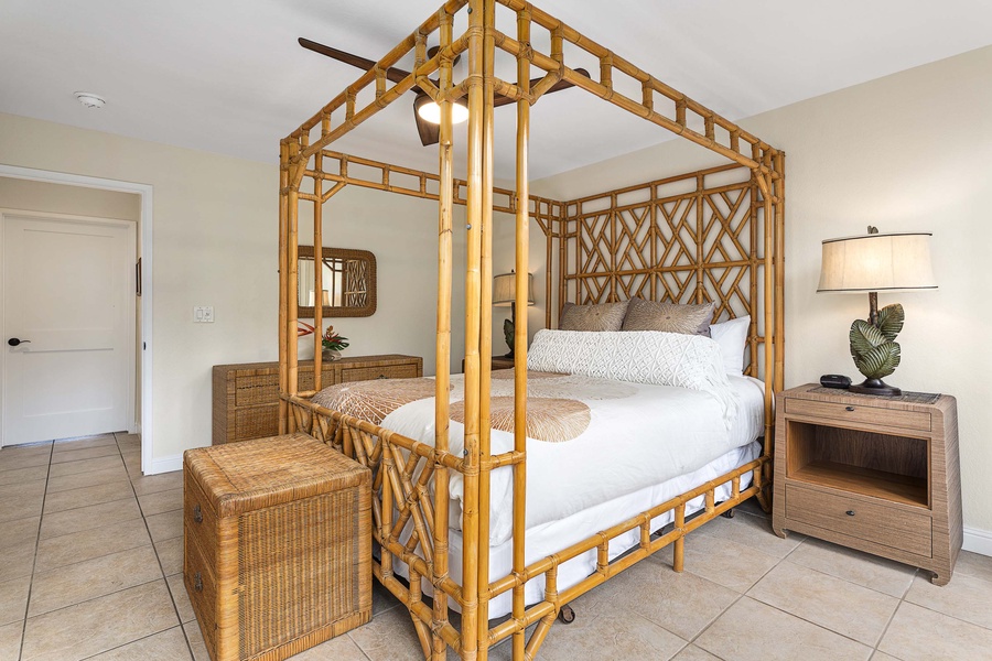 Bamboo bed frame and bamboo furniture adorns the guest bedroom.